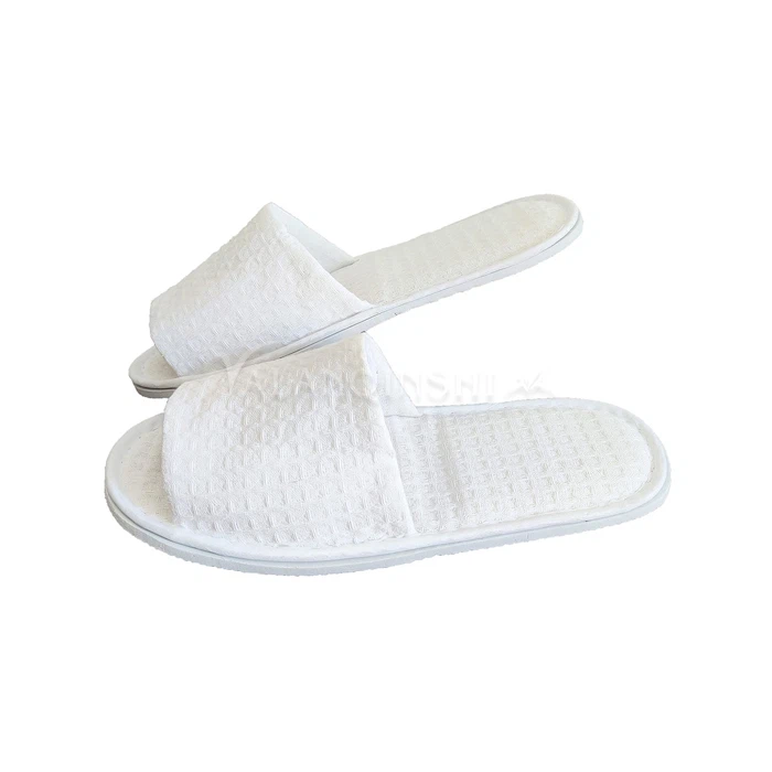 Sabatilles d'hotel amb punta oberta